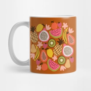 Colorful tropical fruits in brown Mug